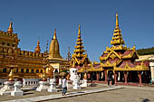 Bagan Myanmar. Shwezigon pagoda. perfumed chambers ancillary temples housing standing bronze Buddha images. 